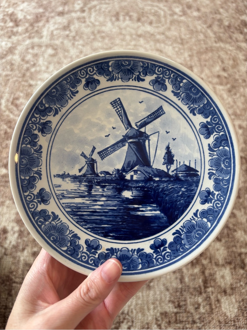 Delft Blue plate with blue windmill scene and floral border